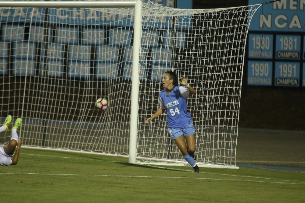 North Carolina forward Sarah Ashley Firstenberg (54) celebrates after heading in UNC's&nbsp;first goal of the season in a 2-0 win over Central Florida.