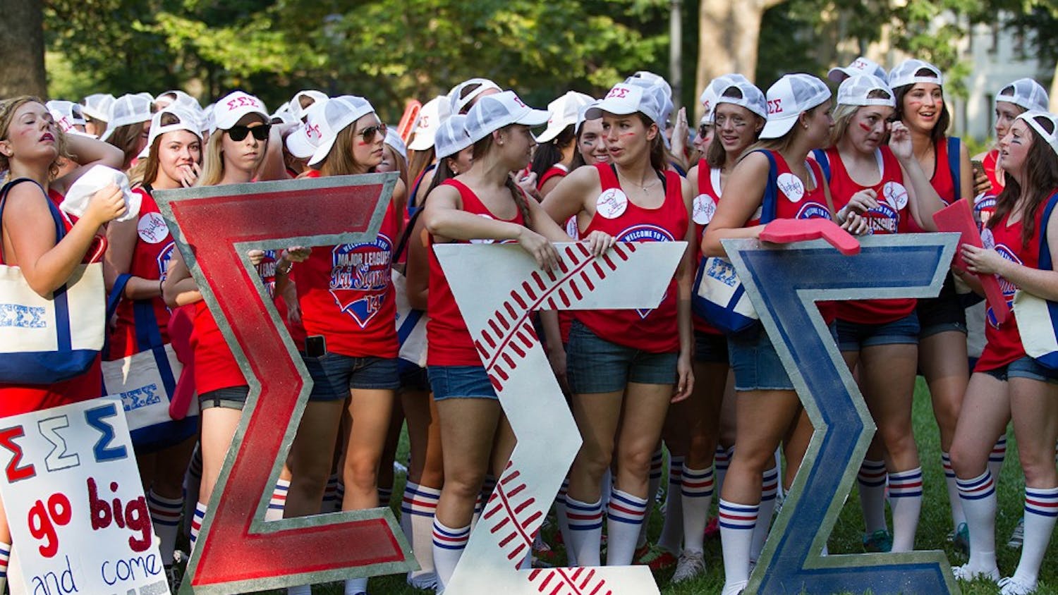 Sigma Sigma Sigma waits to welcome their new members at Bid Day in McCorkle Place.
