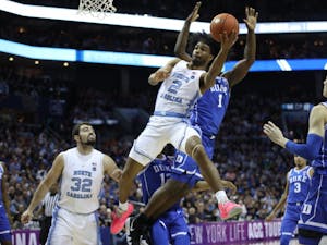 First-year guard Coby White (2) goes for a layup against Duke during the semifinals of the ACC Tournament at the Spectrum Center in Charlotte, N.C. on Friday, March 15, 2019. UNC fell to Duke 73-74.
