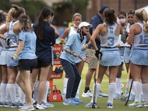 Karen Shelton talks to her team during a timeout during the ACC Field Hockey Championship game against Louisville on Nov. 8, 2020 in the Karen Shelton Stadium. UNC beat Louisville 4-2, securing their fourth consecutive tournament championship.