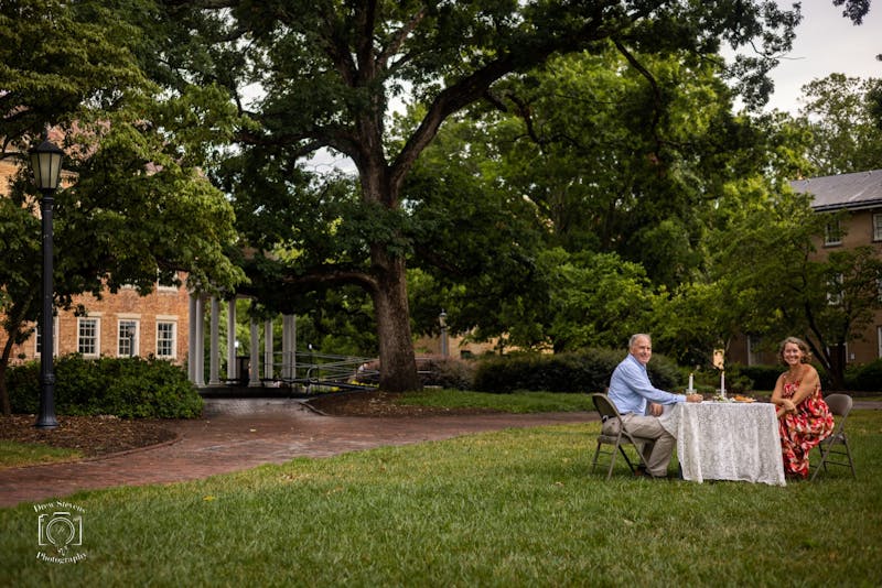 'A Carolina love story': UNC sweethearts recreate proposal at the Old Well