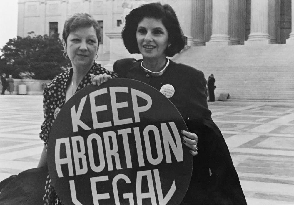 <p>Norma McCorvey (left), the plaintiff of Roe v. Wade, died at age 69. Here,&nbsp;McCorvey (Jane Roe) and her lawyer Gloria Allfred stand&nbsp;on the steps of the Supreme Court, 1989. Photo courtesy of&nbsp;Lorie Shaull.&nbsp;</p>