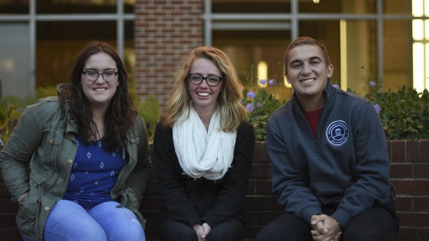 Jamey Cross (right), a first year student and journalism major, Jessica Calland (center), a first year student and biology major, and Chris Sharer, a junior and political science and public policy major, whose hometowns have been affected by the wildfires. 