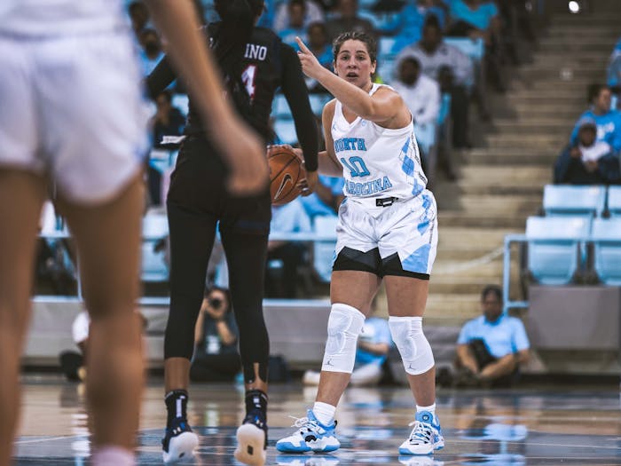UNC redshirt senior guard Eva Hodgson (10) motions to a teammate during the women's basketball game against Jackson State in Carmichael Arena on Wednesday, Nov. 9, 2022. UNC beat Jackson State 91-51.