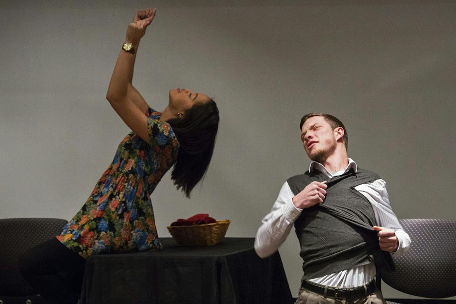 Cara Pugh, left, and Noah Boyd perform a skit on gender roles Monday evening for "What Are You Looking At?," a performance and facilitated discussion program about media literacy and body image issues across gender and race.
