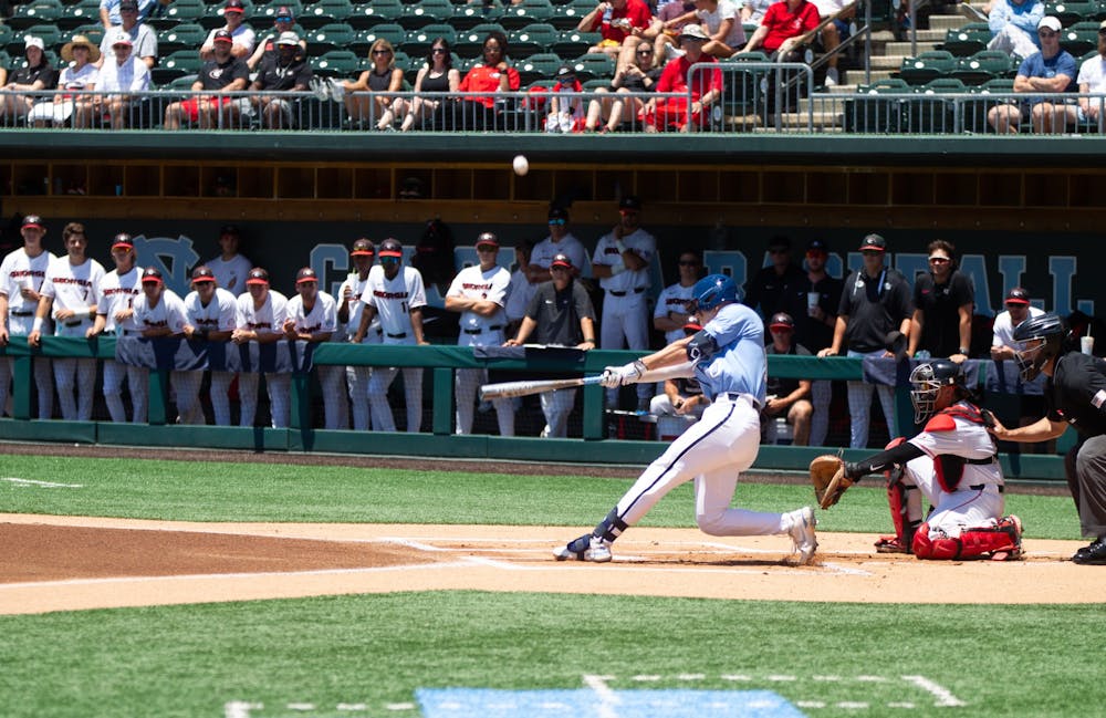 Sophomore infielder Mac Horvath (10) hits the ball during UNC's NCAA Regional against Georgia at Boshamer Stadium on June 5, 2022. UNC won 6-5.
