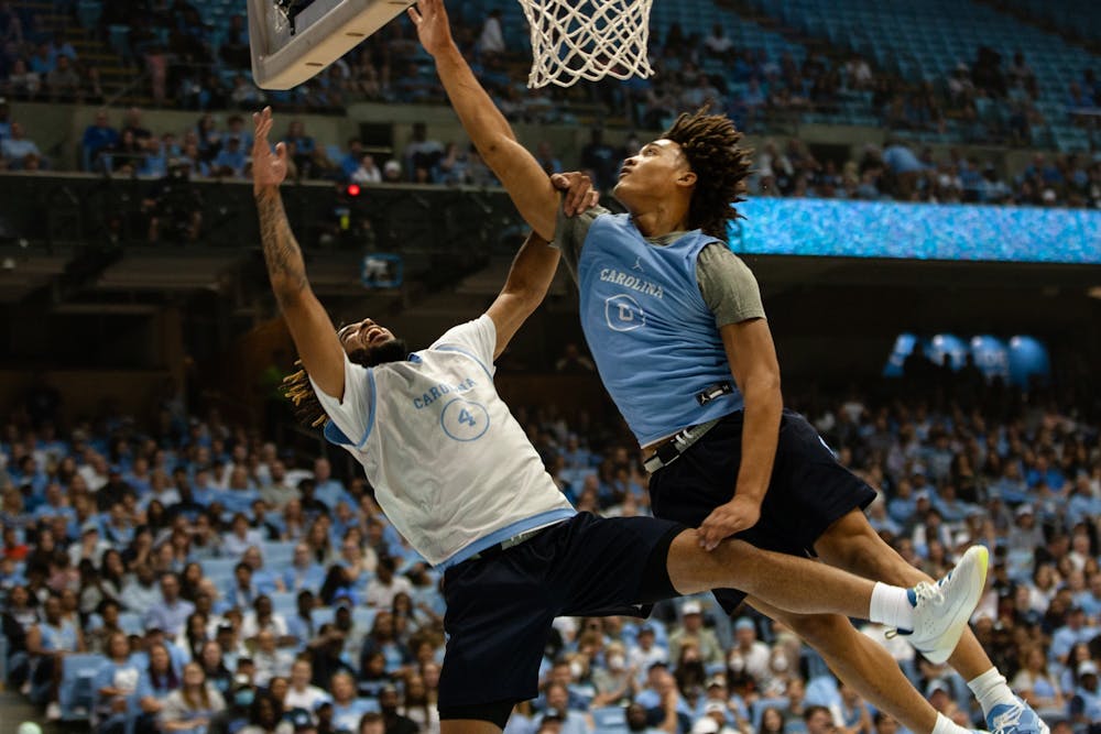 UNC junior guard, Rj Davis (4), is defended by freshman guard, Seth Trimble(0) during scrimmage at the Live Action Carolina Basketball event on Friday, Oct. 7, 2022.