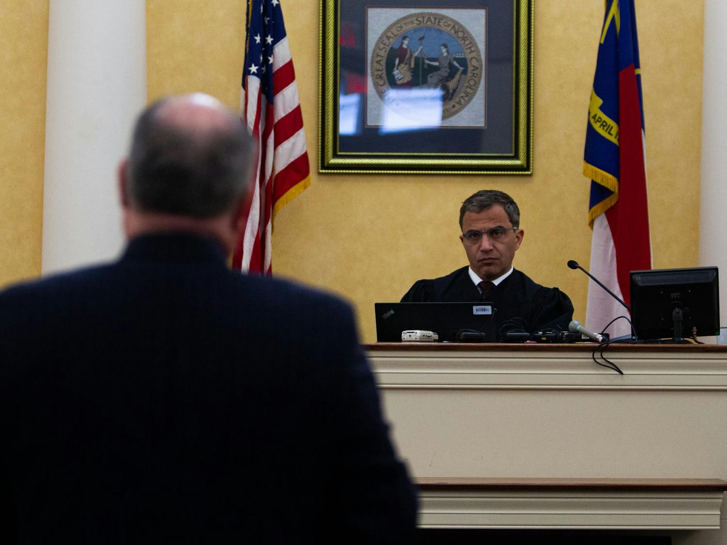 Judge Allen Baddour looks on as Sons of Confederate Veterans Inc's lawyer Boyd Sturges speaks during a hearing in the Orange County Courthouse in Hillsborough on Wednesday, Feb. 12, 2020.&nbsp;
