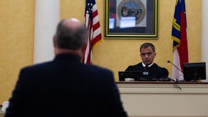 Judge Allen Baddour looks on as Sons of Confederate Veterans Inc's lawyer Boyd Sturges speaks during a hearing in the Orange County Courthouse in Hillsborough on Wednesday, Feb. 12, 2020.&nbsp;