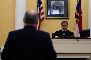 Judge Allen Baddour looks on as Sons of Confederate Veterans Inc's lawyer Boyd Sturges speaks during a hearing in the Orange County Courthouse in Hillsborough on Wednesday, Feb. 12, 2020.&nbsp;