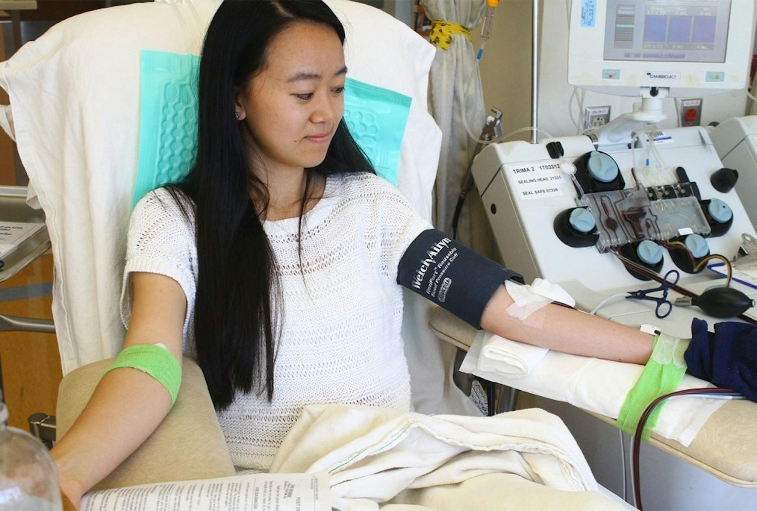 UNC graduate Alice Huang donates blood at the Blood Donation Center at UNC Hospitals in June 2016.