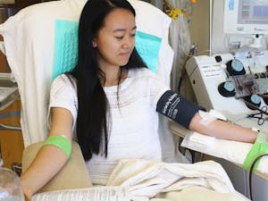 UNC graduate Alice Huang donates blood at the Blood Donation Center at UNC Hospitals in June 2016.