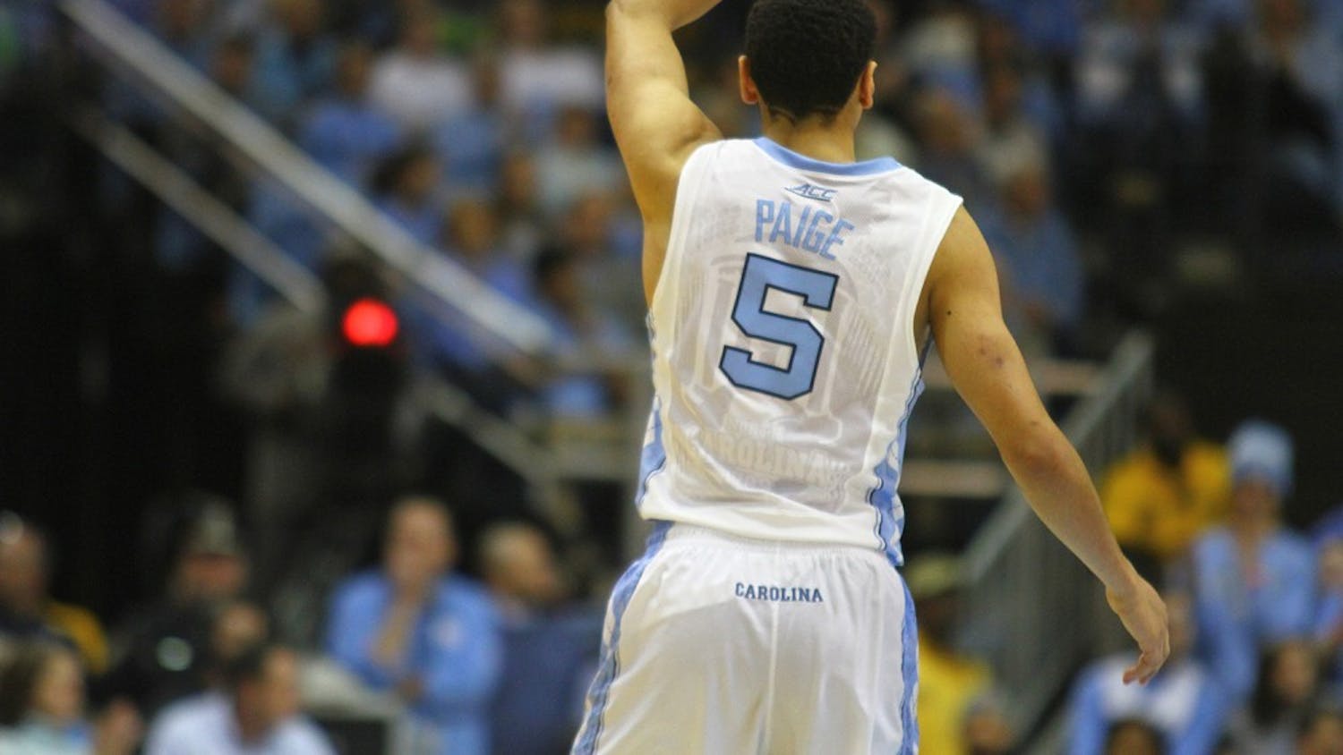 Senior guard Marcus Paige (5) signals to his teammates during last weekend's home game against Pittsburgh. The Tar Heels beat the Panthers 85-54.