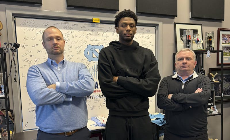 How Jones Angell and Adam Lucas bring the UNC vs. Duke basketball rivalry to life