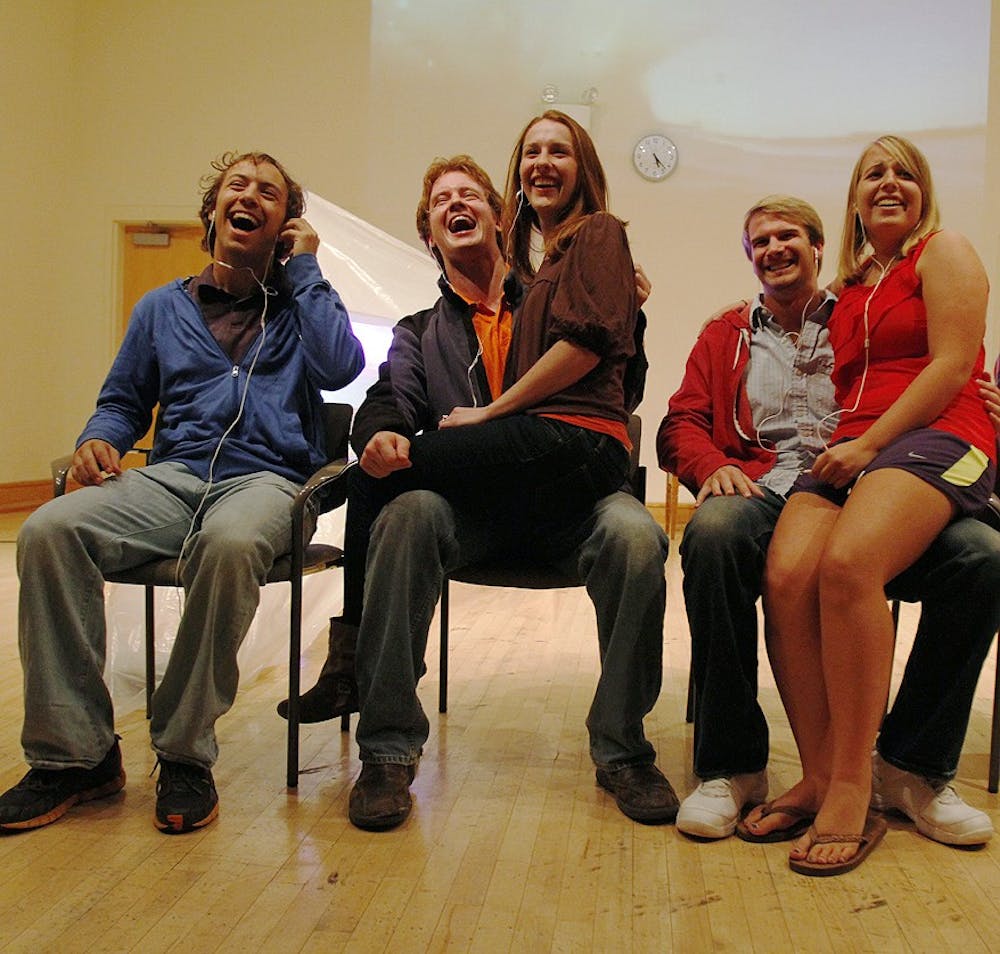 The cast of LAB! Theater's Jon runs through a dress rehearsal on Tuesday night. The play, written by George Saunders directed by Jordan Imbrey will be performed in the CDA October 25-27.

From left to right: James Flowers, Charlie Monroe, Kayla Gibson, Drew Patrick, Amy Whitesell, Noelle Wilson

The cast sits facing the audience looking up at an imaginary screen and laughing during one of the scenes.
