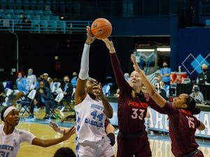 UNC senior center Janelle Bailey (44) attempts a layup in Carmichael Arena on Jan. 14, 2021 in Chapel Hill, N.C. The Tar Heels lost to the Hokies 66-54.