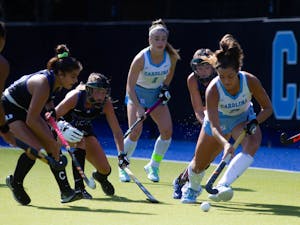 UNC field hockey players fight Duke players for the ball at the game on Sunday, Oct. 18, 2020. UNC won 5-4 in overtime.
