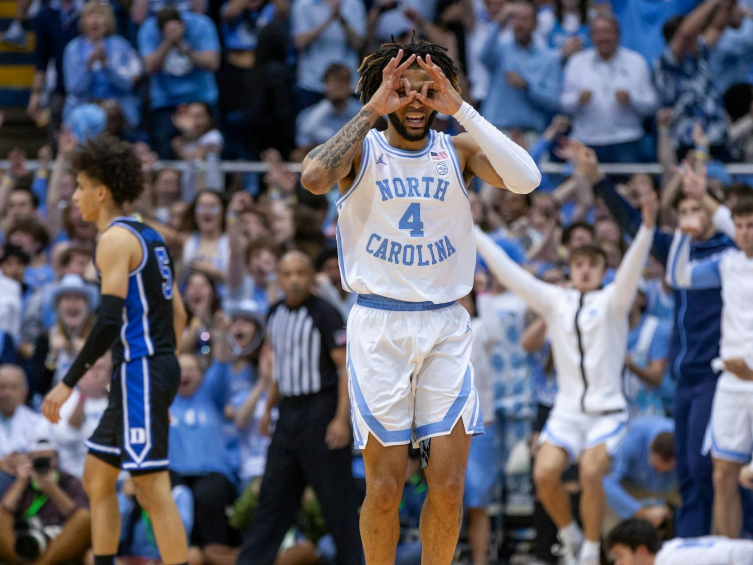 UNC junior guard RJ Davis (4) celebrates a three-pointer during the men's basketball game against Duke at the Dean E. Smith Center on Saturday, March 4, 2023. UNC fell to Duke 62-57.