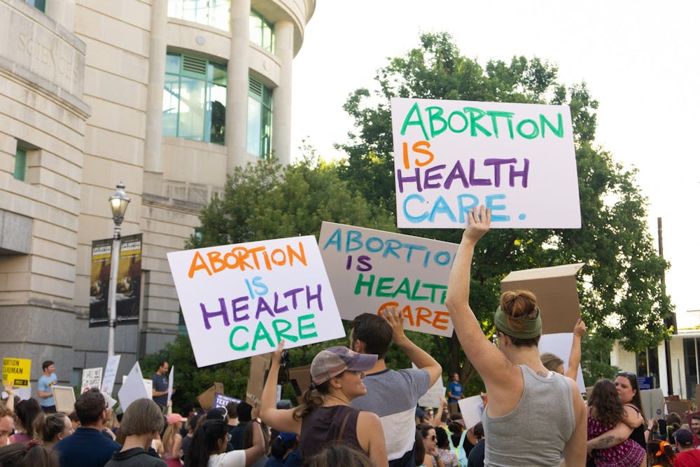 <p>Supporters of abortion rights gather in Raleigh to protest the U.S. Supreme Court's decision to overturn Roe v. Wade on June 24, 2022.</p>