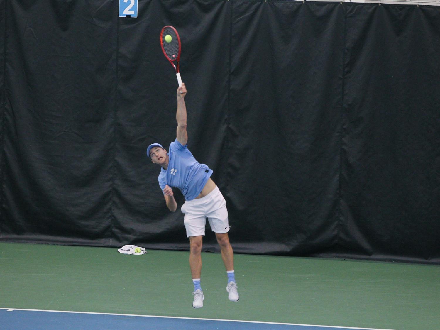 UNC senior Brian Cernoch serves during the Tar Heels’ 4-2 victory over South Carolina in the Cone-Kenfield Tennis Center on Feb. 13, 2022.
