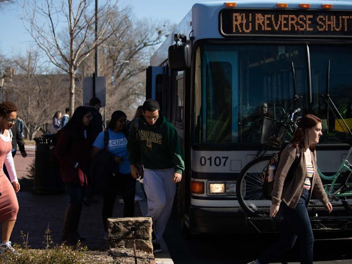 UNC-Chapel Hill Students step off the RU, a bus route of Chapel Hill Transit. The Board of Aldermen seeks to improve public transportation by working with Chapel Hill Transit to more effectively manage the current level of public transportation services in Carrboro , and extend service into areas of Carrboro not served by a fixed route service. Damon Seils, Board of Aldermen's liaison to the Transportation Advisory Board, discussed how transportation may be used to fight climate change and give more people the opportunity to use public transportation.&nbsp;