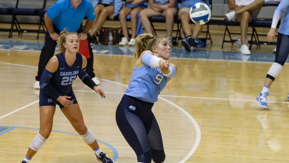 Sophomore outside hitter Mabrey Shaffmaster (9) goes to bump the ball over the net. UNC beat Arizona 3-2 at home on Saturday, Sept. 3, 2022.