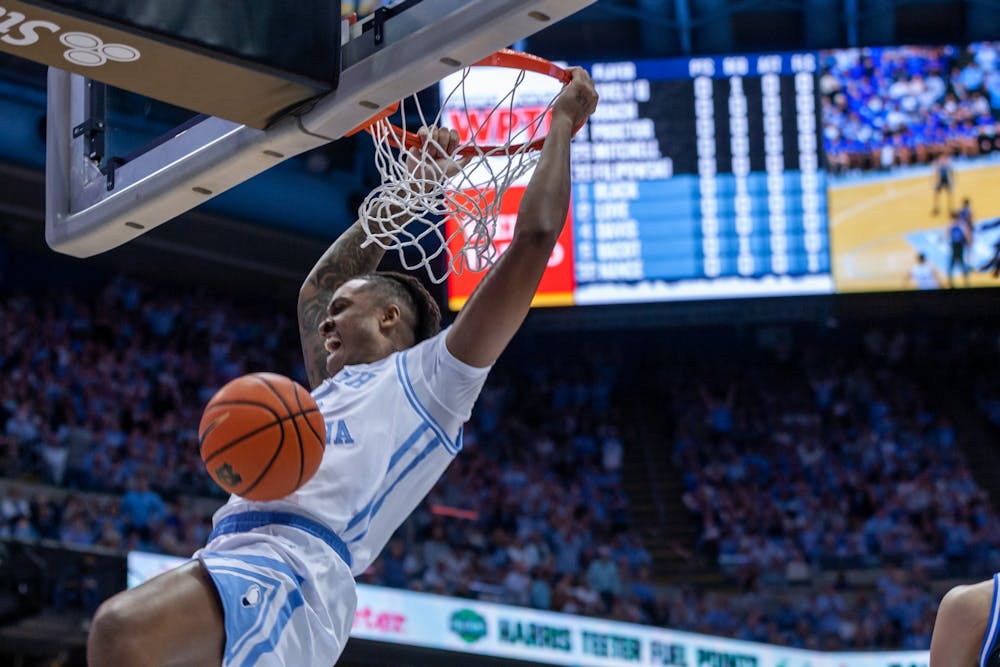 UNC senior forward Armando Bacot (5) dunks the ball during the men's basketball game against Duke at the Dean E. Smith Center on Saturday, March 4, 2023. UNC fell to Duke 62-57.