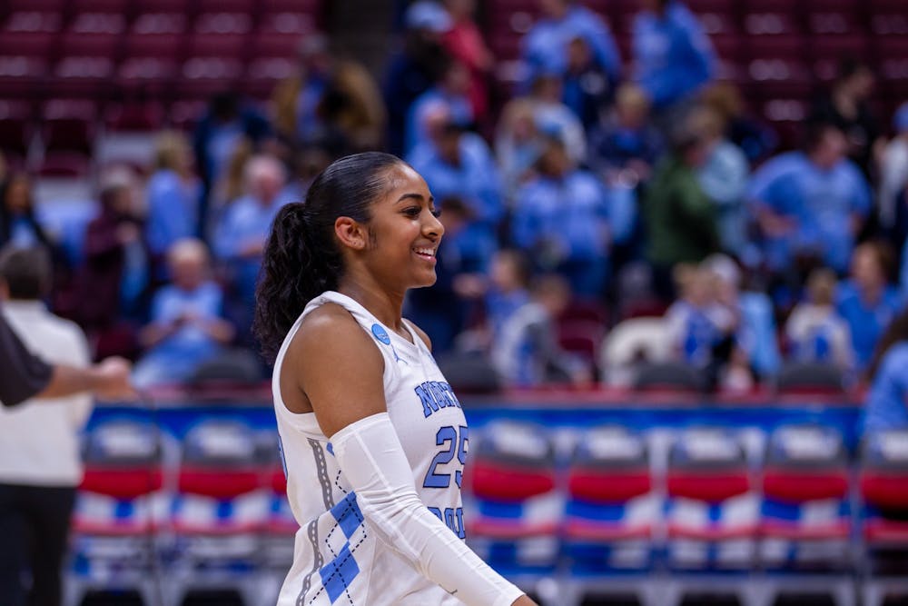 <p>UNC junior guard Deja Kelly smiles after UNC’s NCAA Tournament first-round game against the St. John’s Red Storm in the Schottenstein Center in Columbus, Ohio on Saturday, March 18, 2023. The Tar Heels won 61-59.</p>