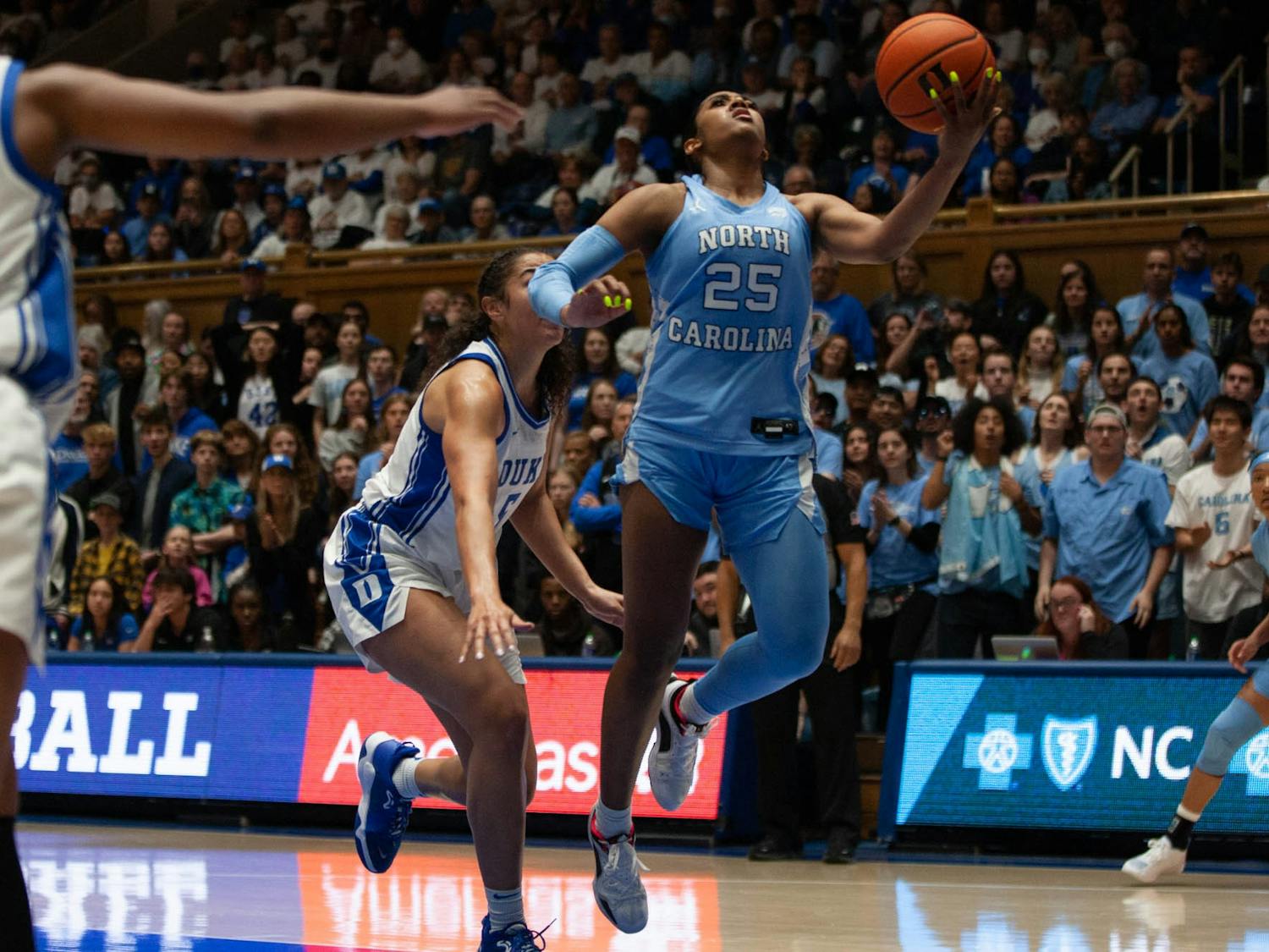 UNC junior guard Deja Kelly (25) shoots a layup during the women’s basketball game against Duke on Sunday, Feb. 26, 2023, at Cameron Indoor Stadium. UNC defeated Duke 45-41.