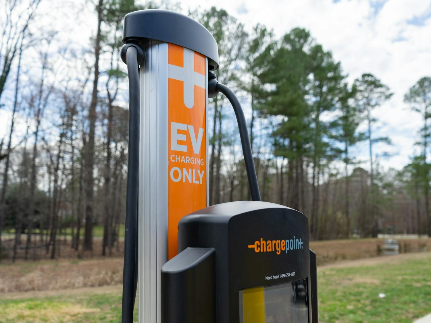 An EV charging station sits in the parking lot of Martin Luther King Jr. Park in Carrboro, NC on Thursday, Mar. 3, 2022. This is one of two EV charging stations recently added in the Town of Carrboro.