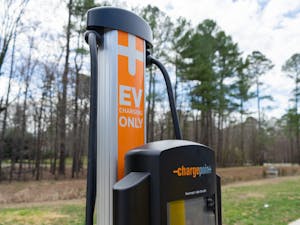 An EV charging station sits in the parking lot of Martin Luther King Jr. Park in Carrboro, NC on Thursday, Mar. 3, 2022. This is one of two EV charging stations recently added in the Town of Carrboro.