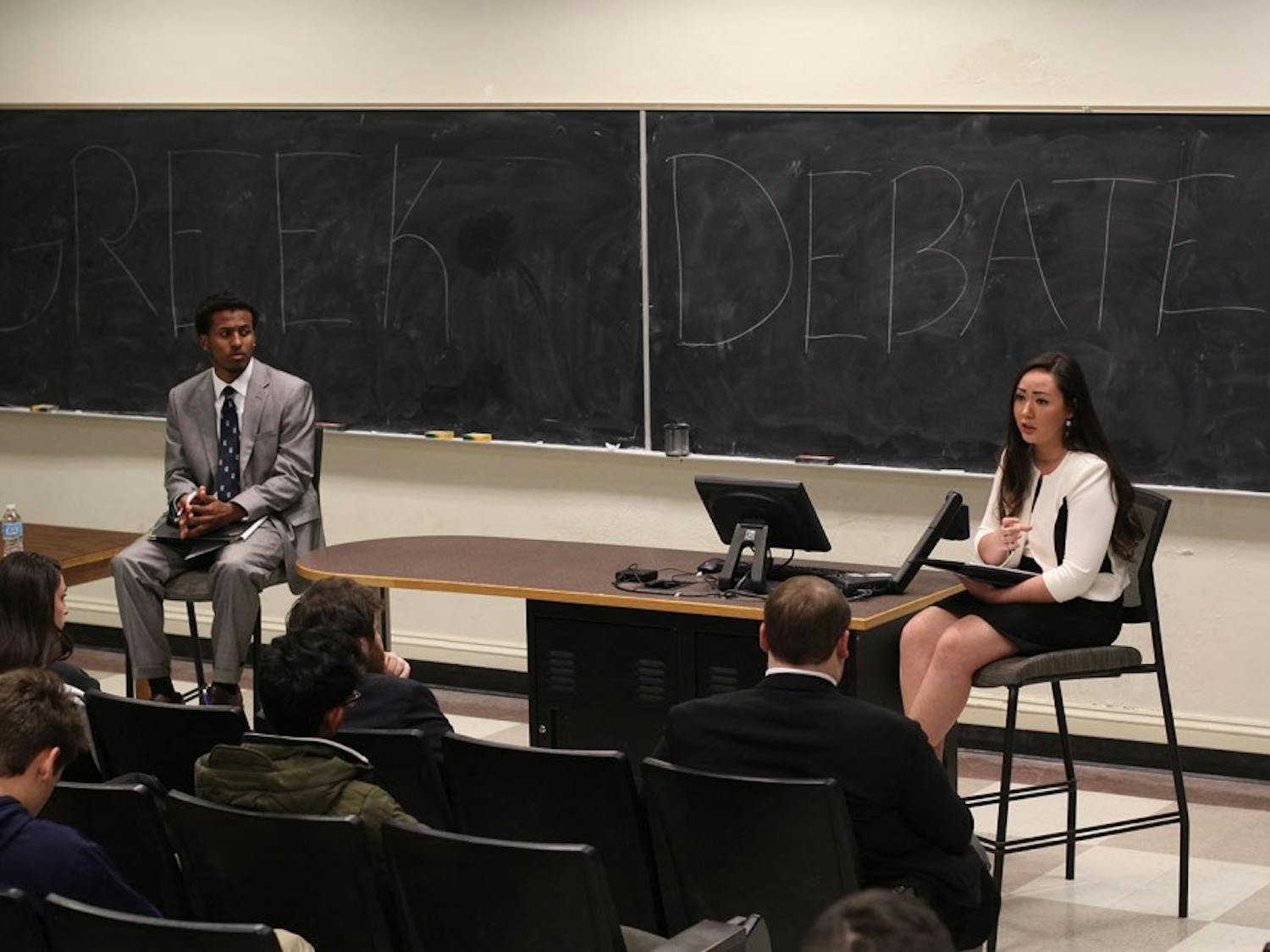 Student body president candidates Maurice Grier (left) and Elizabeth Adkins respond to questions asked by leaders of the Greek Organizations IFC, GAC, NPHC, and the PHC.