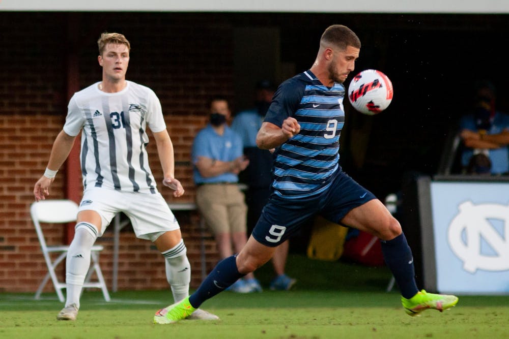 UNC redshirt senior forward Santiago Herrera (9) gains possession of the ball during the UNC v. Georgia Southern game at Dorrance Field on Sept. 3.