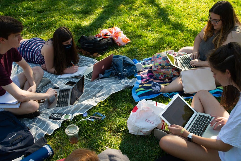 First year students who live together in Morrison study on the quad at Polk Place on April 27, 2021. Many LDOC events are online this year because of COVID-19.