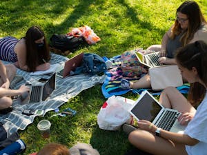First year students who live together in Morrison study on the quad at Polk Place on April 27, 2021. Many LDOC events are online this year because of COVID-19.