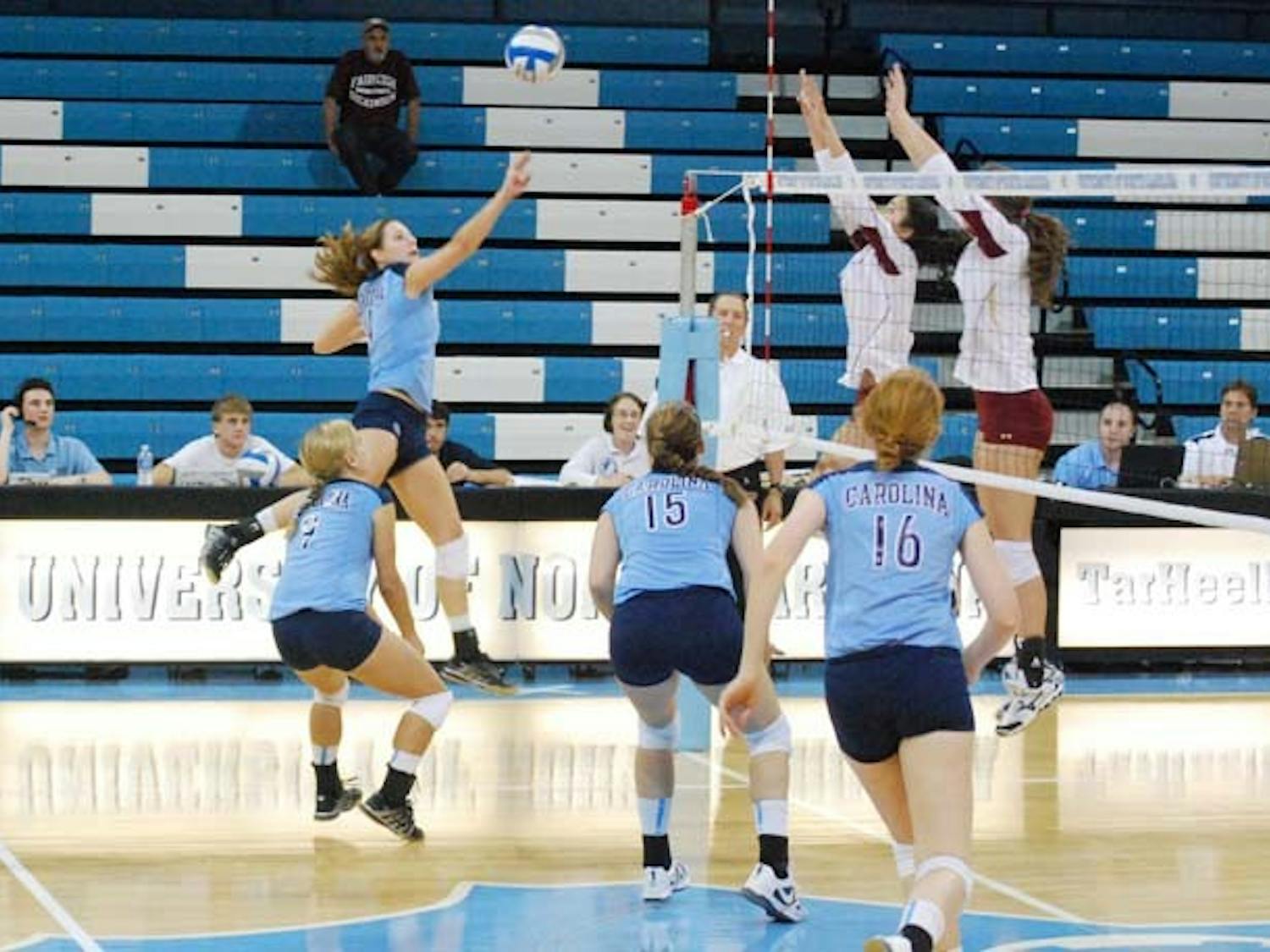 	A UNC volleyball player prepares to knock the ball over the net. North Carolina has two preseason All-ACC players on its roster this season.