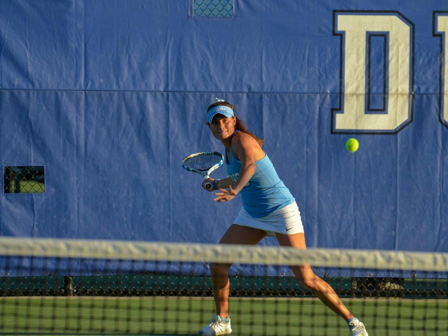 Sophomore Alexa Graham returns a serve against Duke on April 20 at the Ambler Tennis Center in Durham.