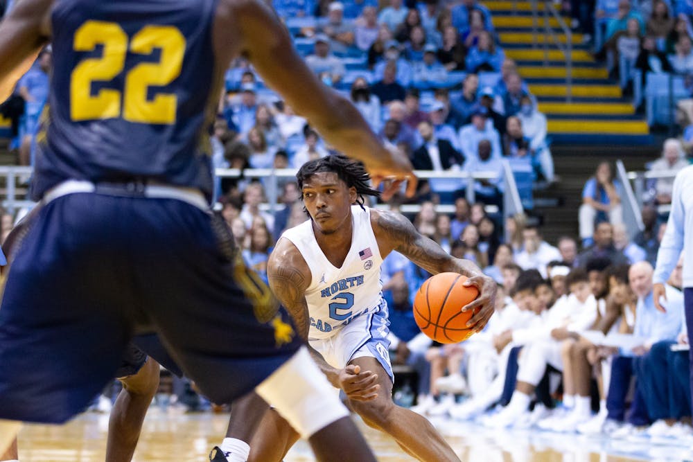 <p>UNC junior guard Caleb Love (2) dribbles the ball during the basketball game against JCSU on Friday, Oct. 8, 2022.</p>