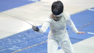 Aubrey Molloy competes at the ACC fencing championship at Carmichael Arena in Chapel Hill on Feb. 27, 2021. 
Photo Courtesy of UNC Athletics/Jeffrey A. Camarati.