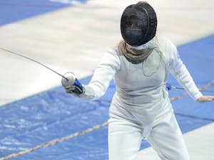 Aubrey Molloy competes at the ACC fencing championship at Carmichael Arena in Chapel Hill on Feb. 27, 2021. Photo courtesy of UNC Athletics/Jeffrey A. Camarati.