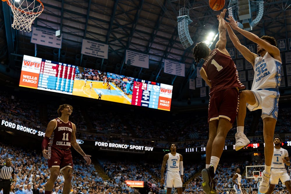 UNC graduate forward Pete Nance (32) shoots the ball during UNC's game against Boston College on Tuesday, Jan. 17, 2022. UNC won 72-64.