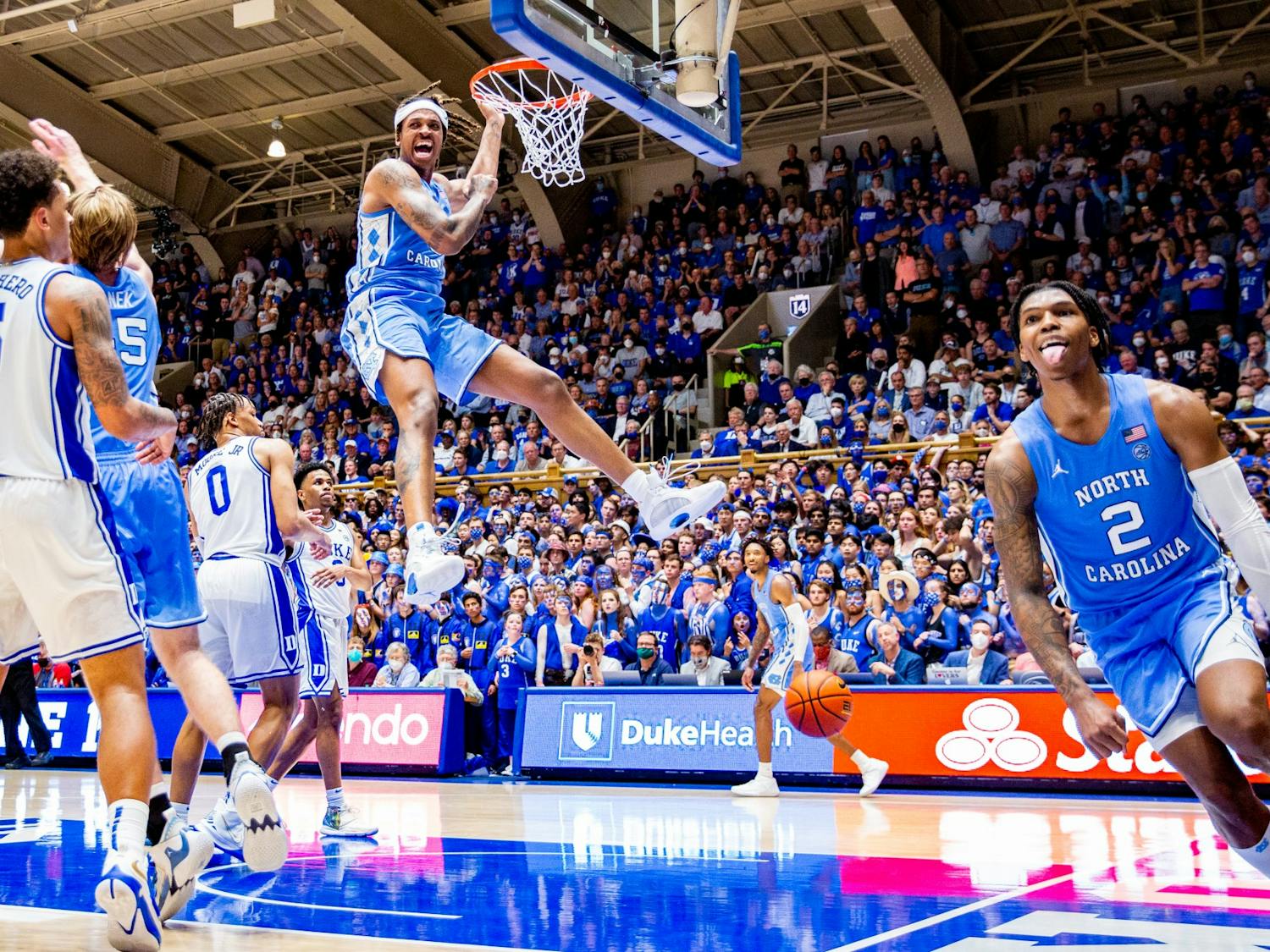 Junior forward Armando Bacot (5) dunks the ball at the game against Duke at Cameron Stadium on March 5, 2022. UNC won 94-81.