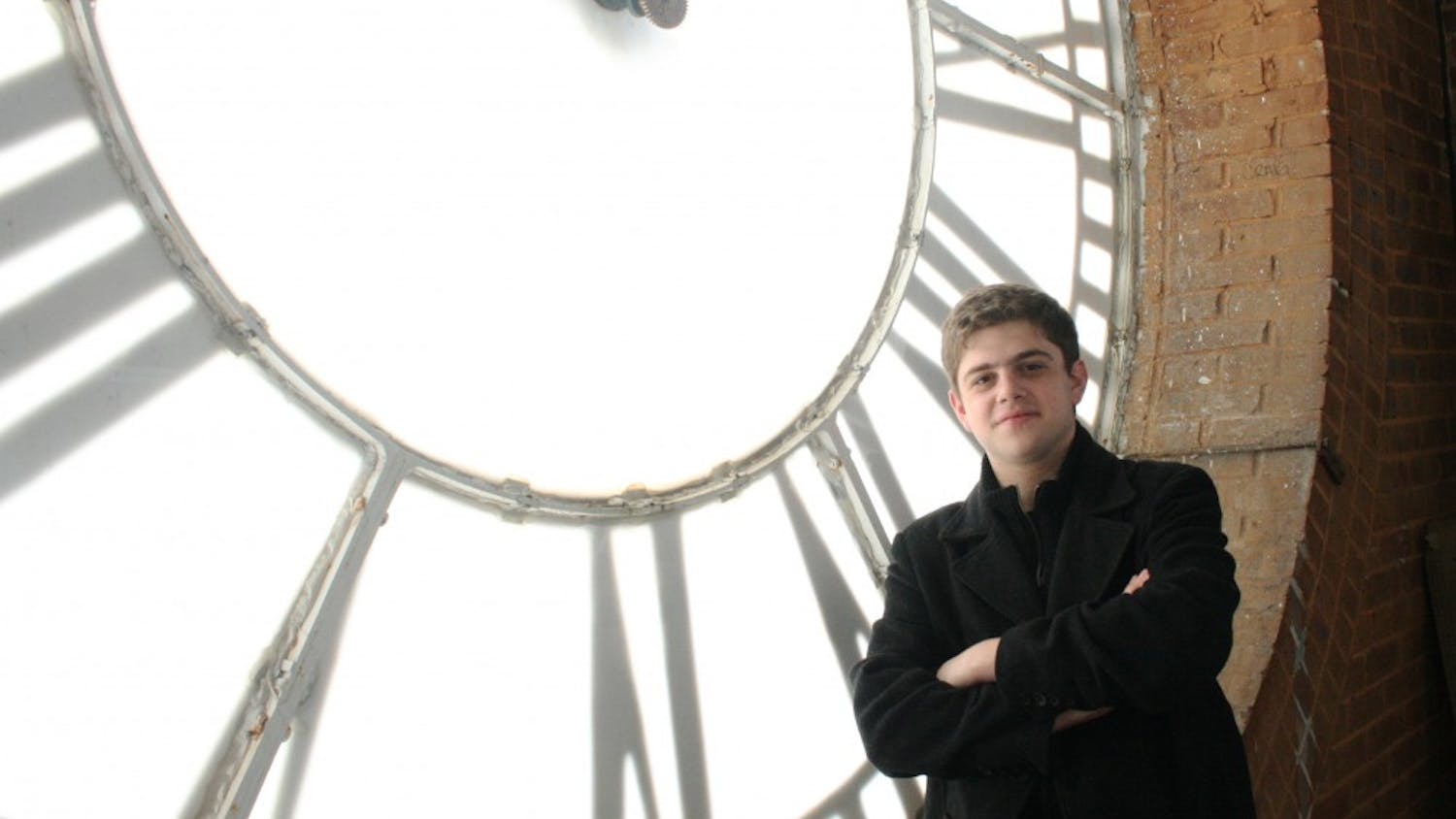 Photo: UNC senior Michael Crosa takes pride in controlling the Bell Tower’s traditional tunes (Claire McNeill)