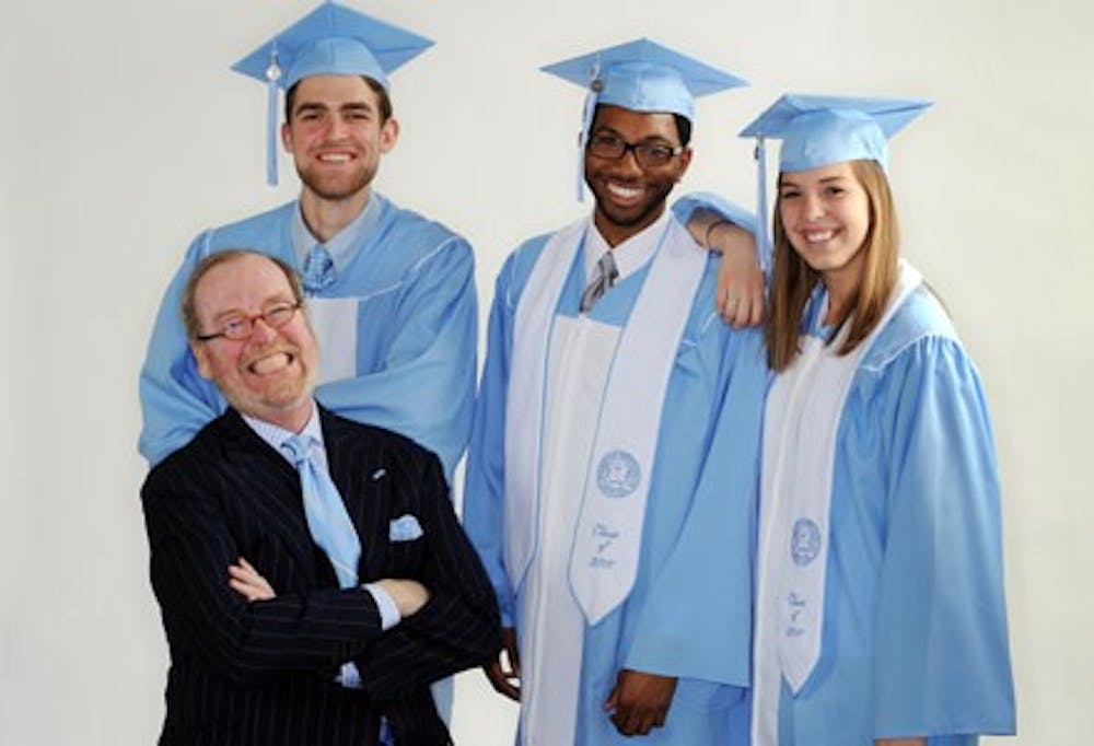 	<p>Alexander Julian, bottom left, designed the new graduation gowns worn here by son Will, senior class vice president Justin Tyler and senior class chief marshal Chelsea Phillips. Photo courtesy of <span class="caps">UNC</span>.</p>