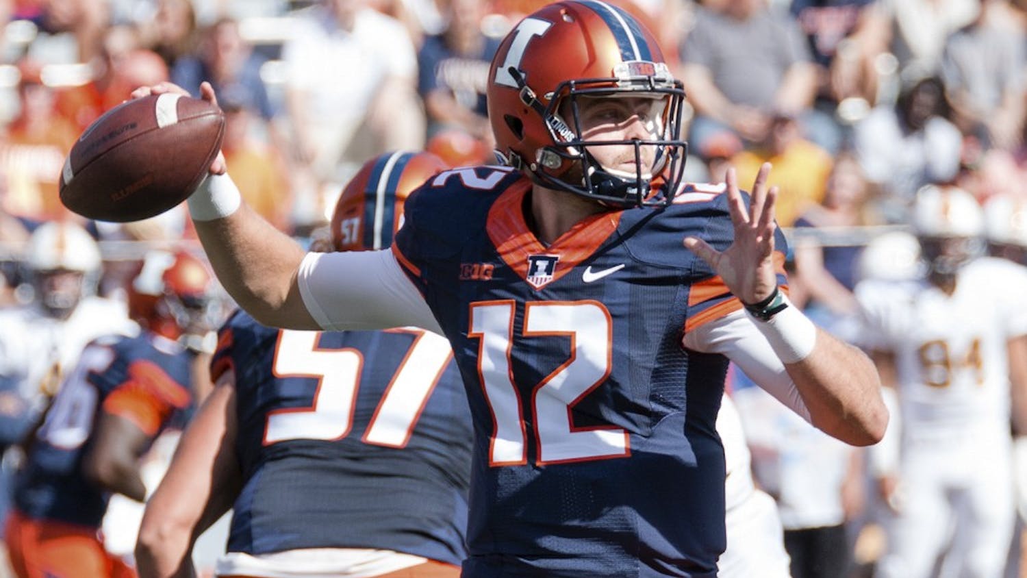 Illinois quarterback Wes Lunt (12) looks to pass the ball during the game against Murray State at Memorial Stadium on Saturday, September 3. The Illini won 52-3.