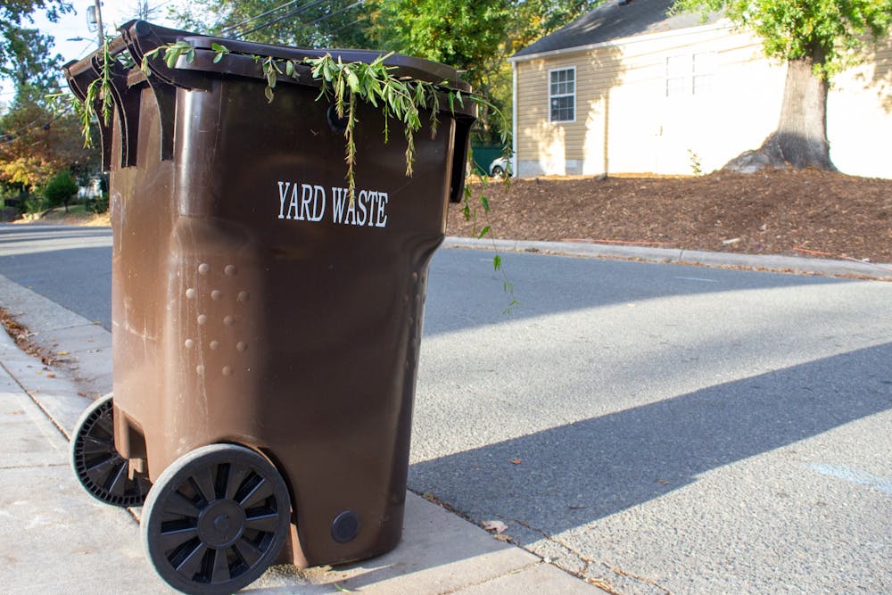 A yard waste bin sits outside the driveway of a home on Church Street on Oct. 13, 2022.