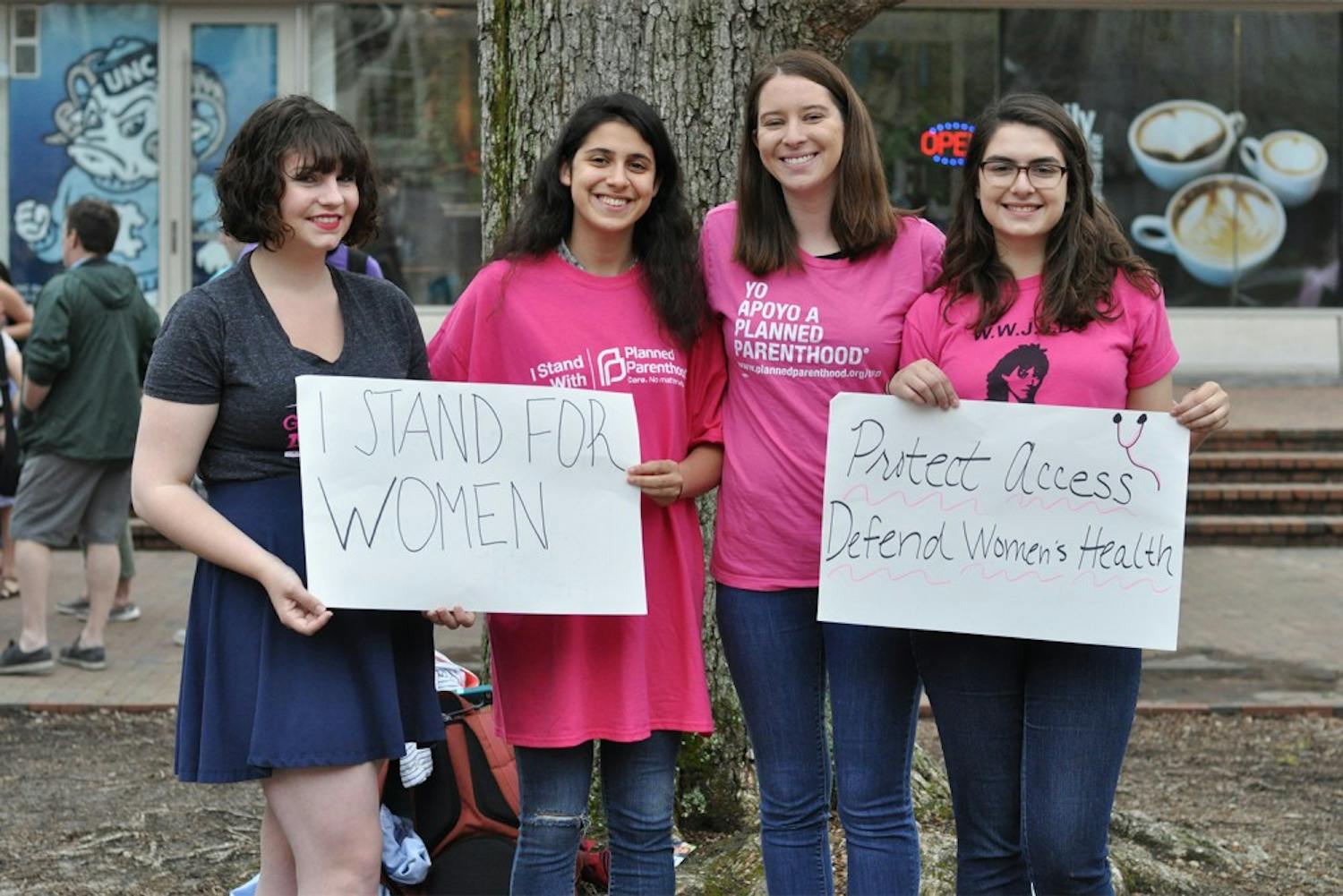 From left to right, Cara Schumann, Ori Hashmonay, Megan Cross, and Emily Goldstein gathered in the pit to rally for abortion rights on Thursday. 