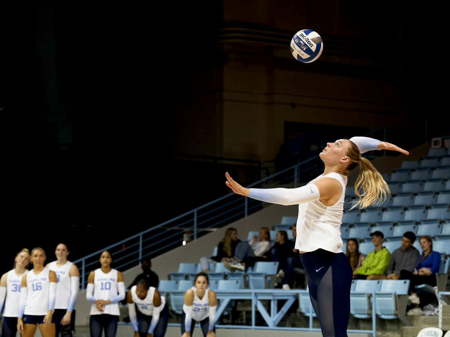 UNC graduate student outside hitter Charley Niego (5) hits the ball during the volleyball match against the University of Miami on Friday, Sept. 30, 2022, at Carmichael Arena. UNC lost 1-3.