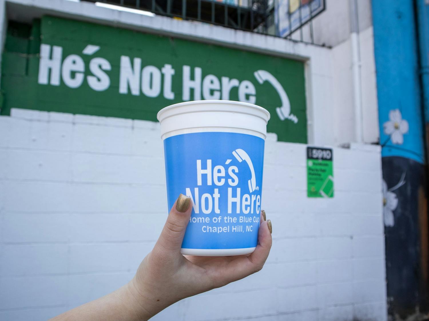 A blue cup is pictured outside of He's Not Here on Feb. 27, 2023.