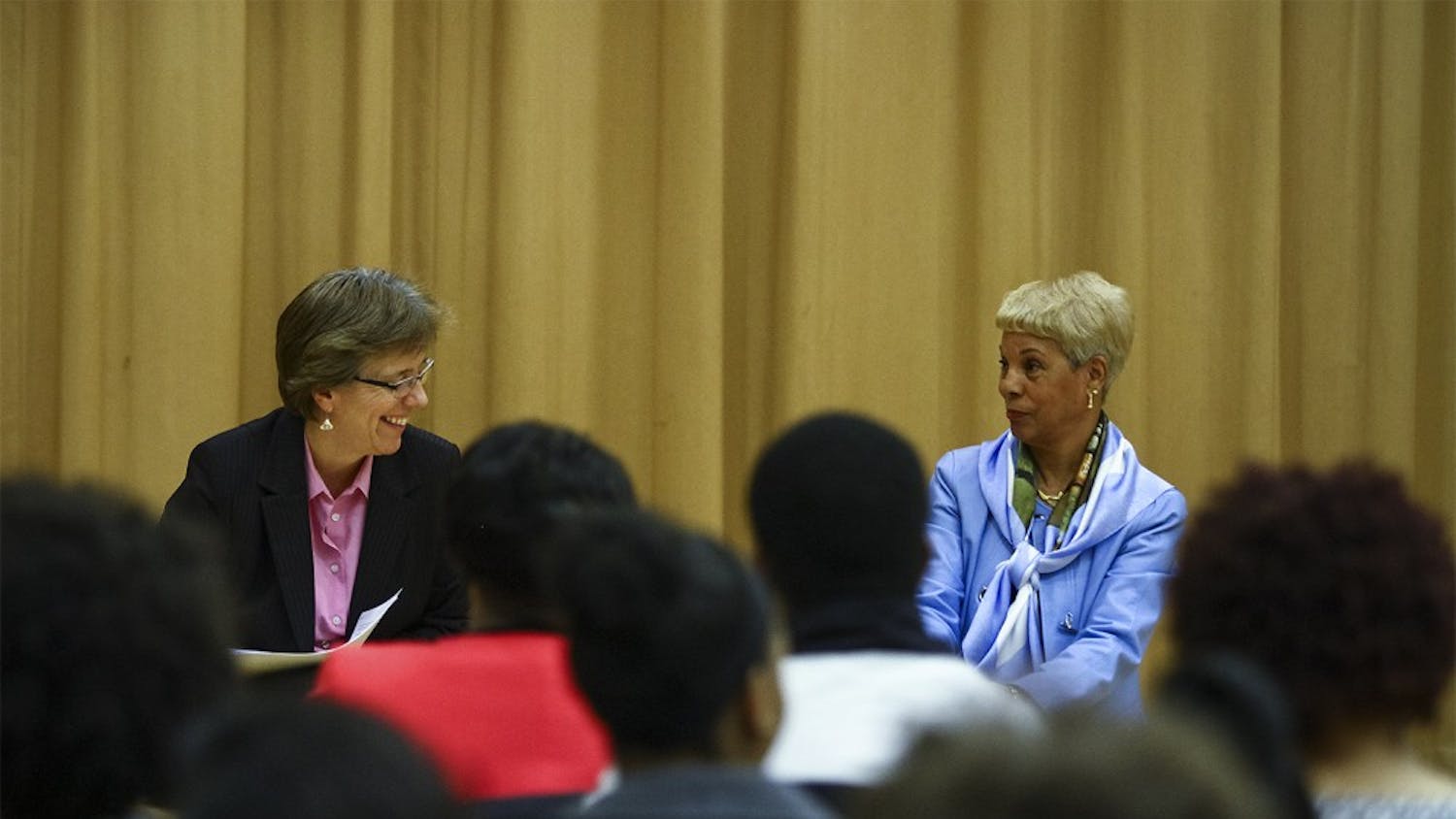 Carrboro mayor Lydia LaBelle and Edith Parker, a Carolina alumnus, speak on a panel of minority women leaders in the Stone Center on Wednesday evening.